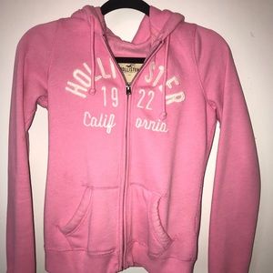 A pink zip up hoodie